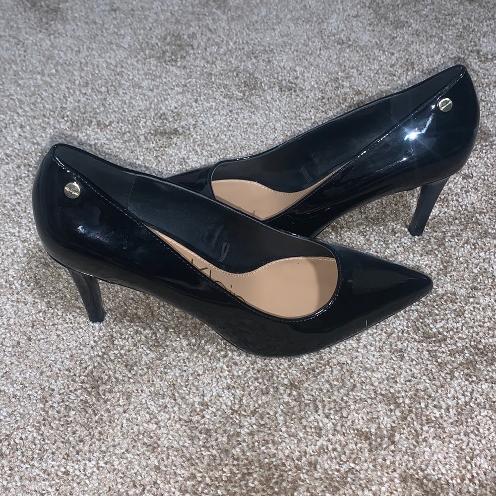 Size 7 Calvin Klein heel. Used. Black
